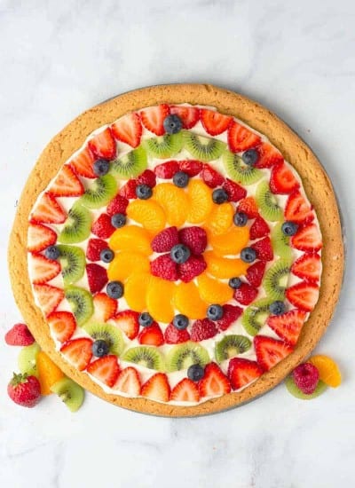 Fruit Pizza topped with strawberries, blueberries, kiwi, mandarin oranges, raspberry