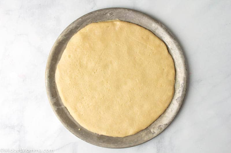 sugar cookie dough on a pizza pan