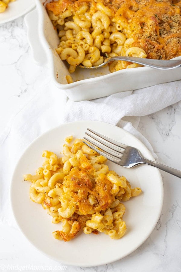 the best baked macaroni and cheese on a plate on the dinner table