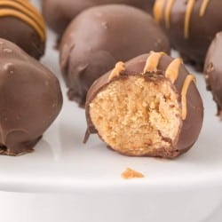 close up photo of Peanut Butter Balls with a bite taken out of one