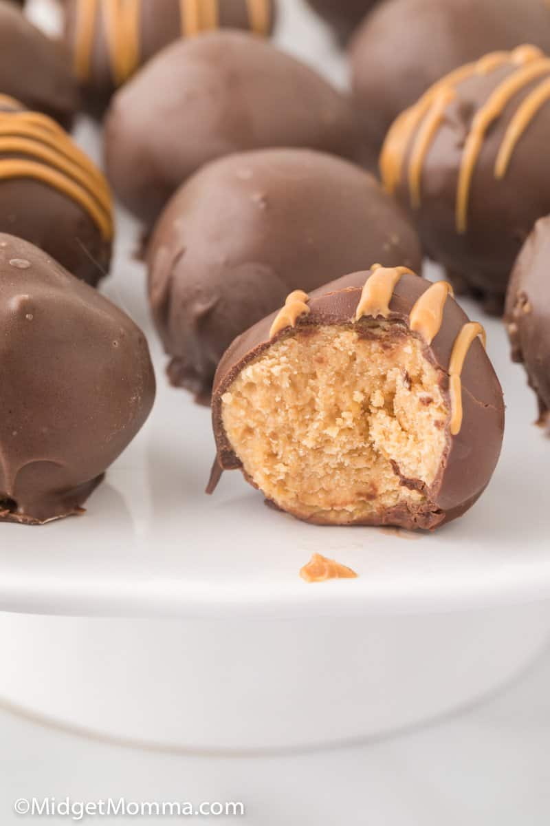 close up photo of Peanut Butter Balls with a bite taken out of one