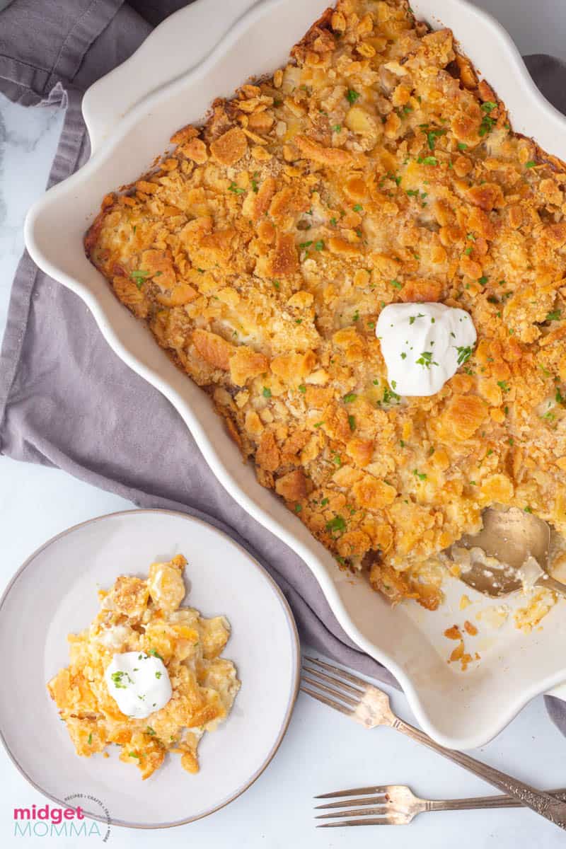 party potatoes in a dish with a plate of potatoes next to it