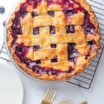 Making blueberry pie from scratch is much easier then you might think! This homemade blueberry pie is bursting with fresh juicy blueberries and tastes amazing alone or with some vanilla ice cream on top.