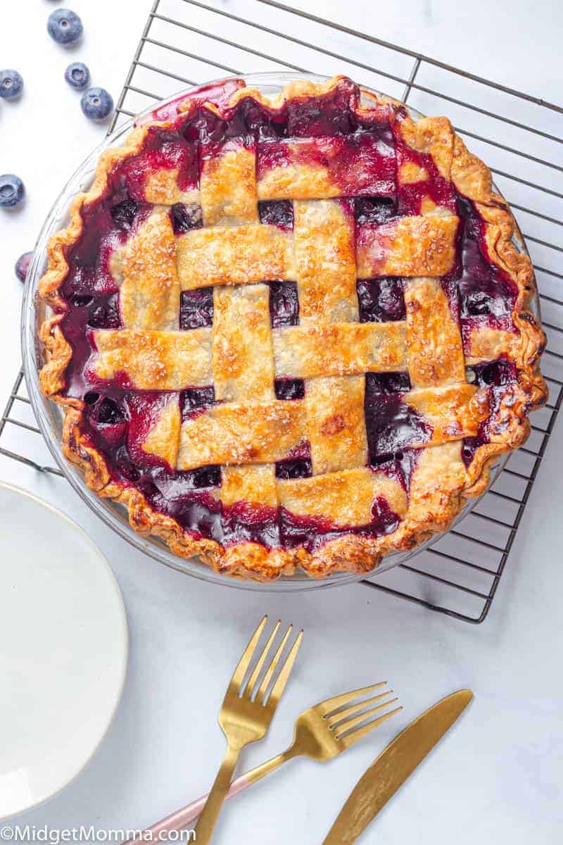 Making blueberry pie from scratch is much easier then you might think! This homemade blueberry pie is bursting with fresh juicy blueberries and tastes amazing alone or with some vanilla ice cream on top.