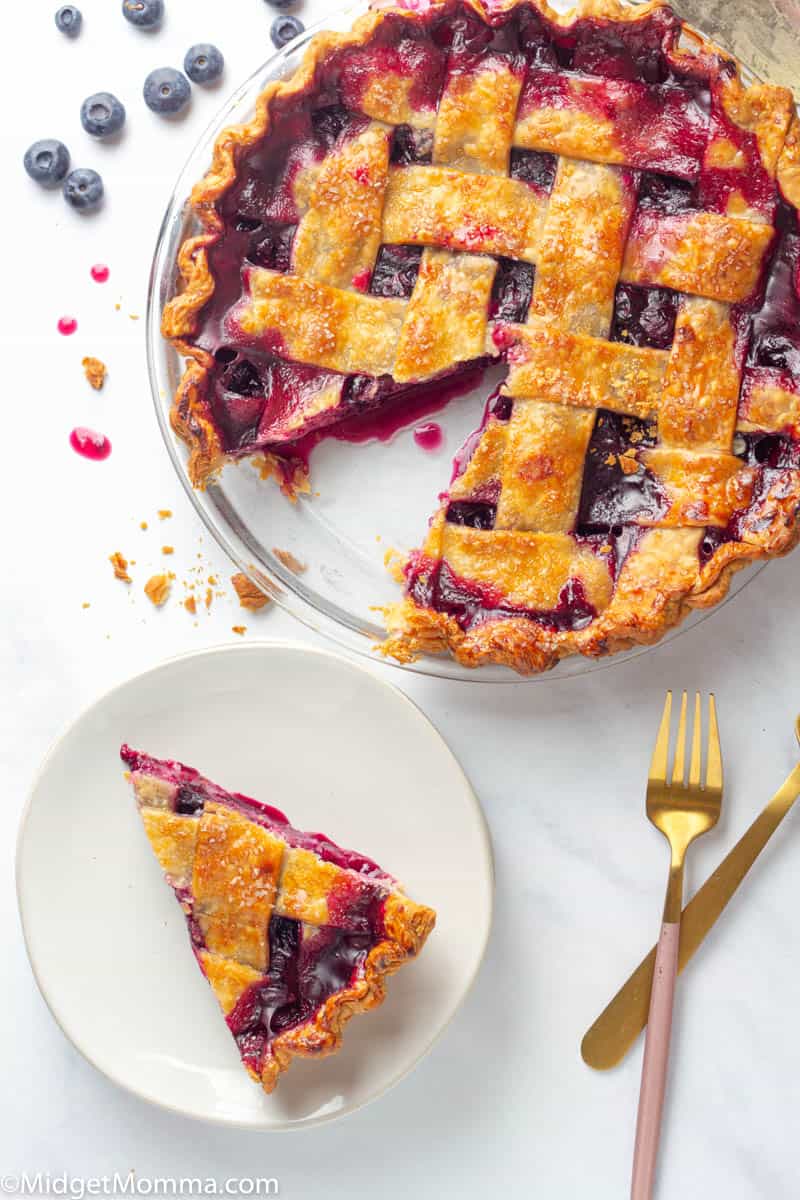 Making blueberry pie from scratch is much easier then you might think! This homemade blueberry pie is bursting with fresh juicy blueberries and tastes amazing alone or with some vanilla ice cream on top.