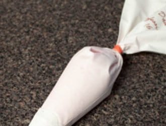 Filled pastry bag sitting on the c