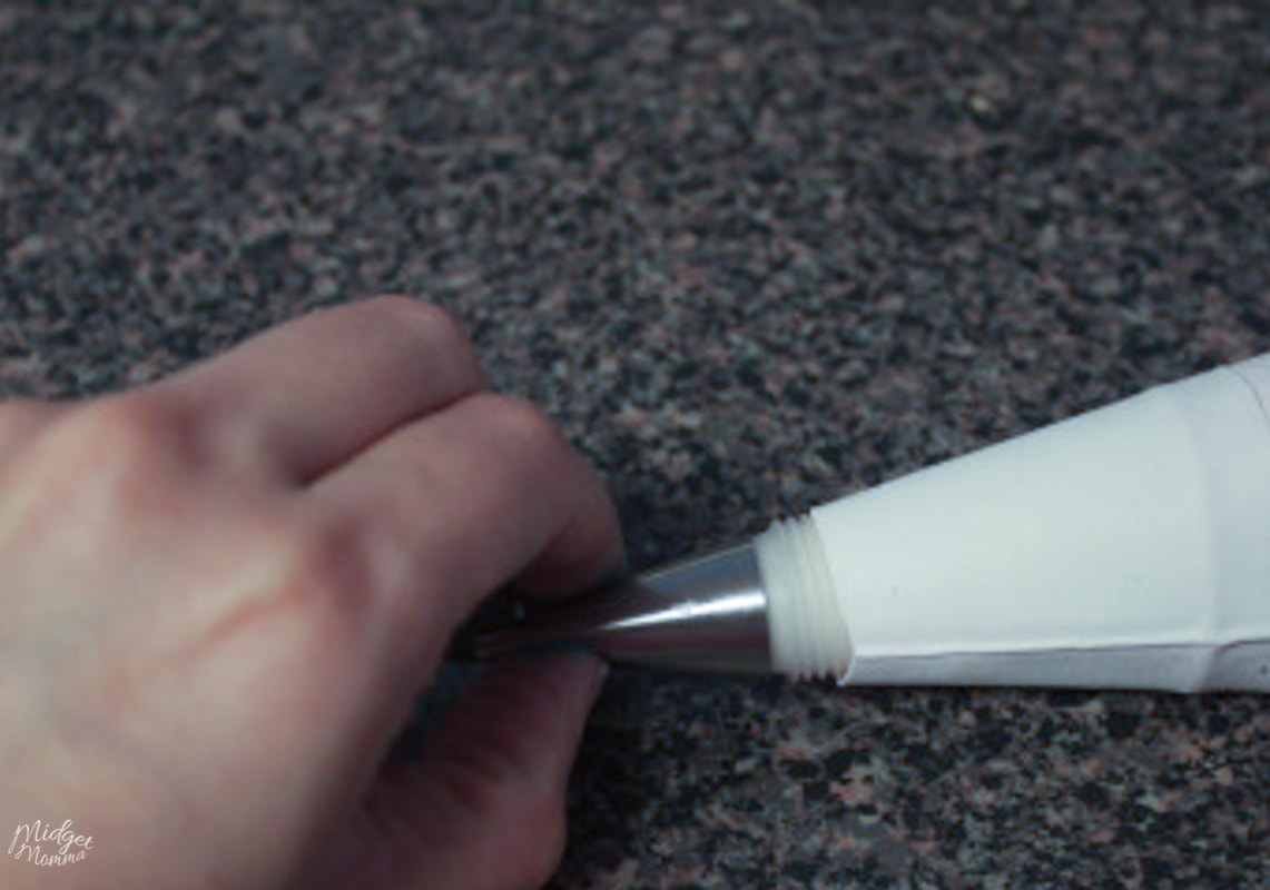 frosting tip being added to the pastry bag