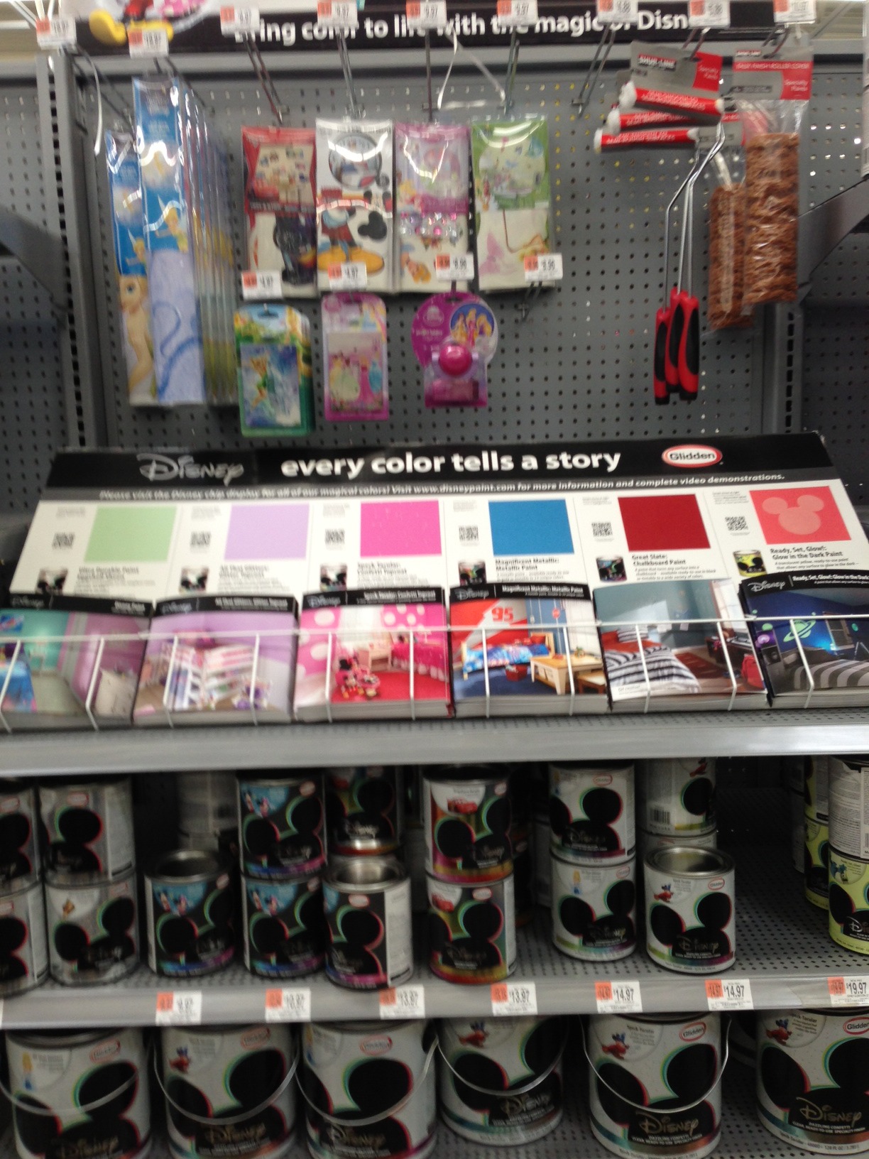 checking out the new disney glidden paint at walmart