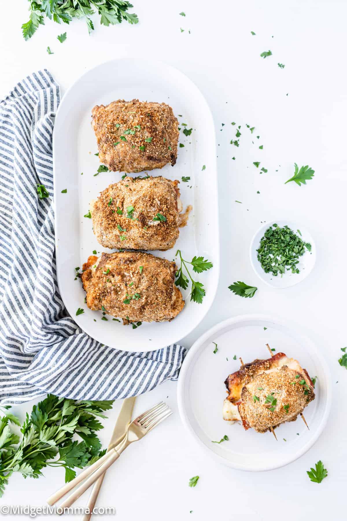 cooked chicken cordon bleu on a serving platter