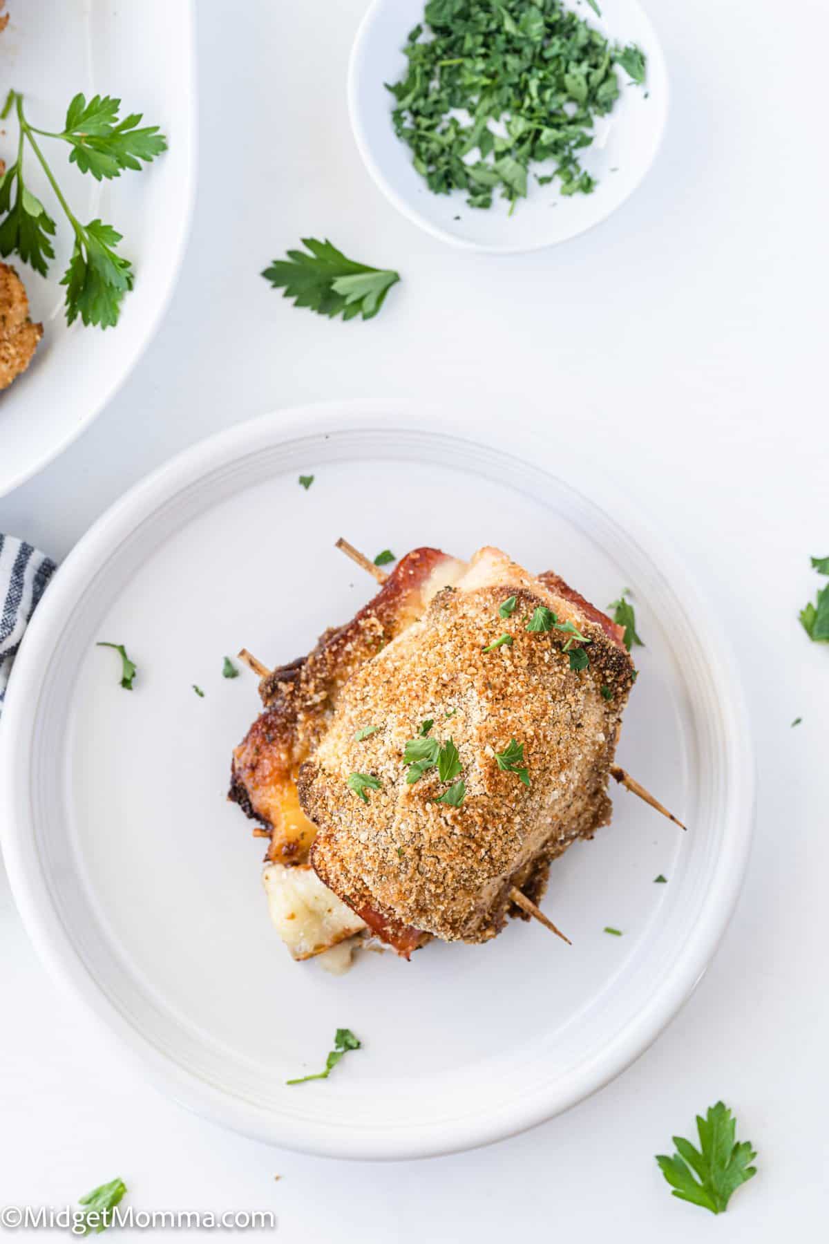 overhead photo of cooked chicken stuffed with ham and cheese