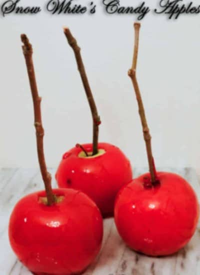 These Snow White's Candy Apples Recipe are sweet Halloween treat that even snow white herself would have a hard time to turn down.
