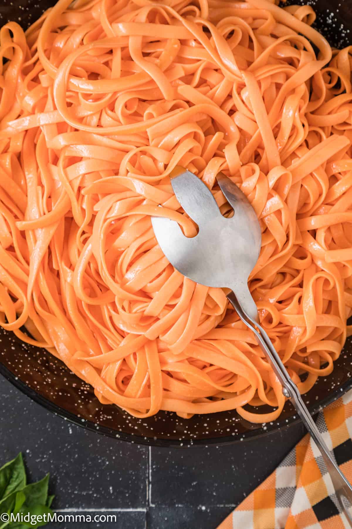 large bowl of orange colored pasta 