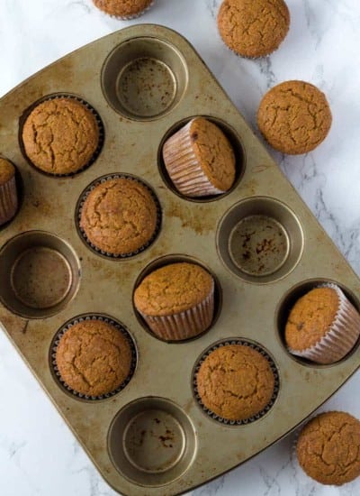 Whole Wheat Pumpkin muffins in a muffin tin