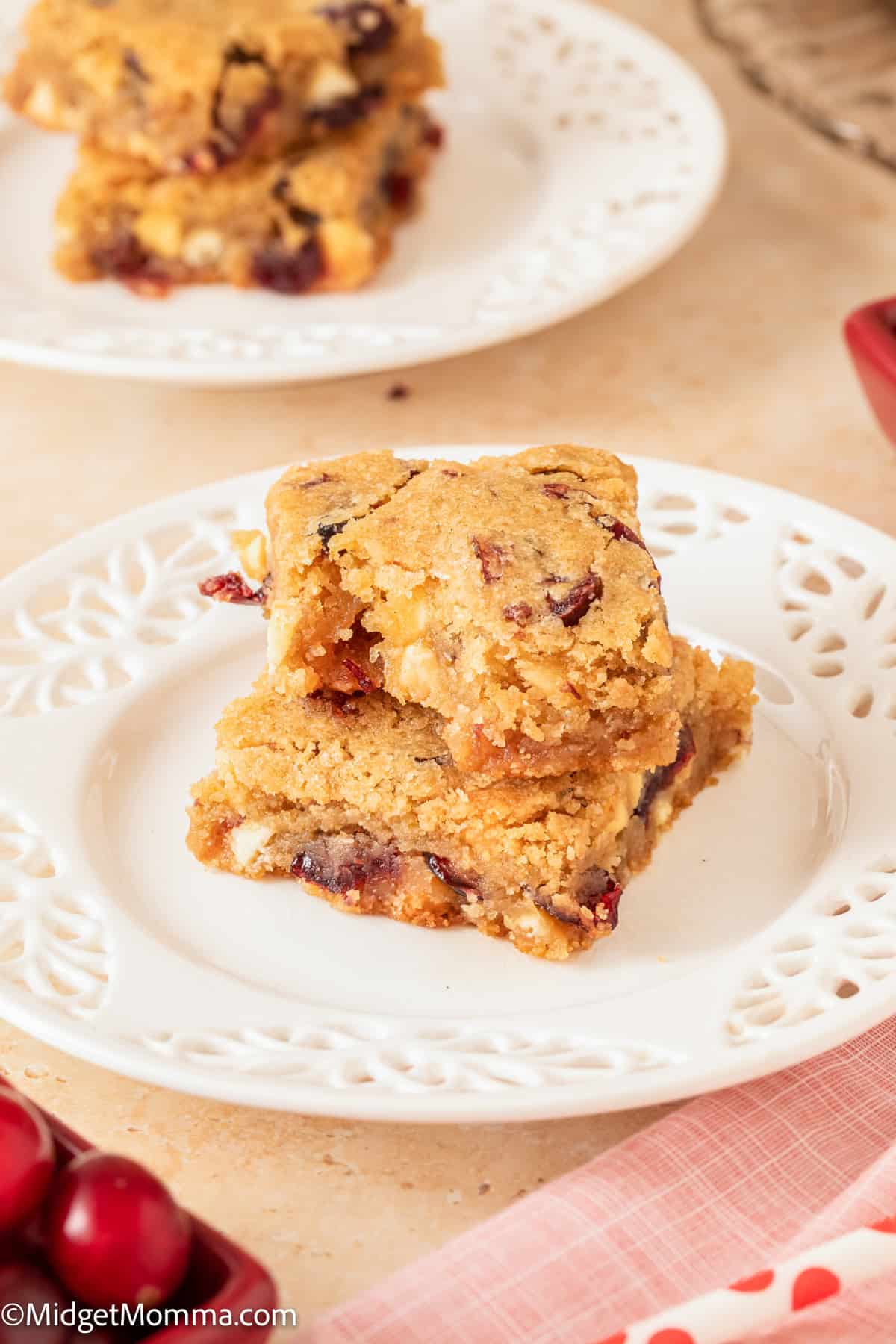 Cranberry white chocolate blondies on a plate