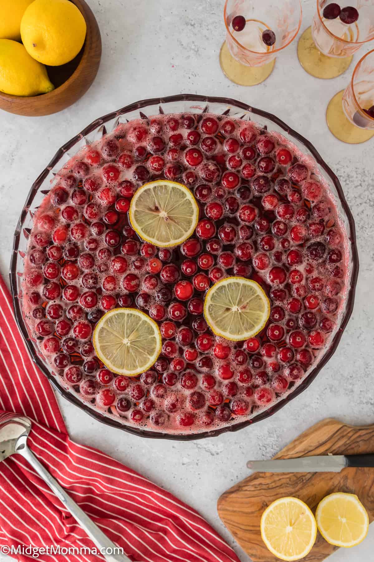 large glass bowl of cranberry party punch 
