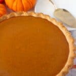 homemade pumpkin pie in a pie dish