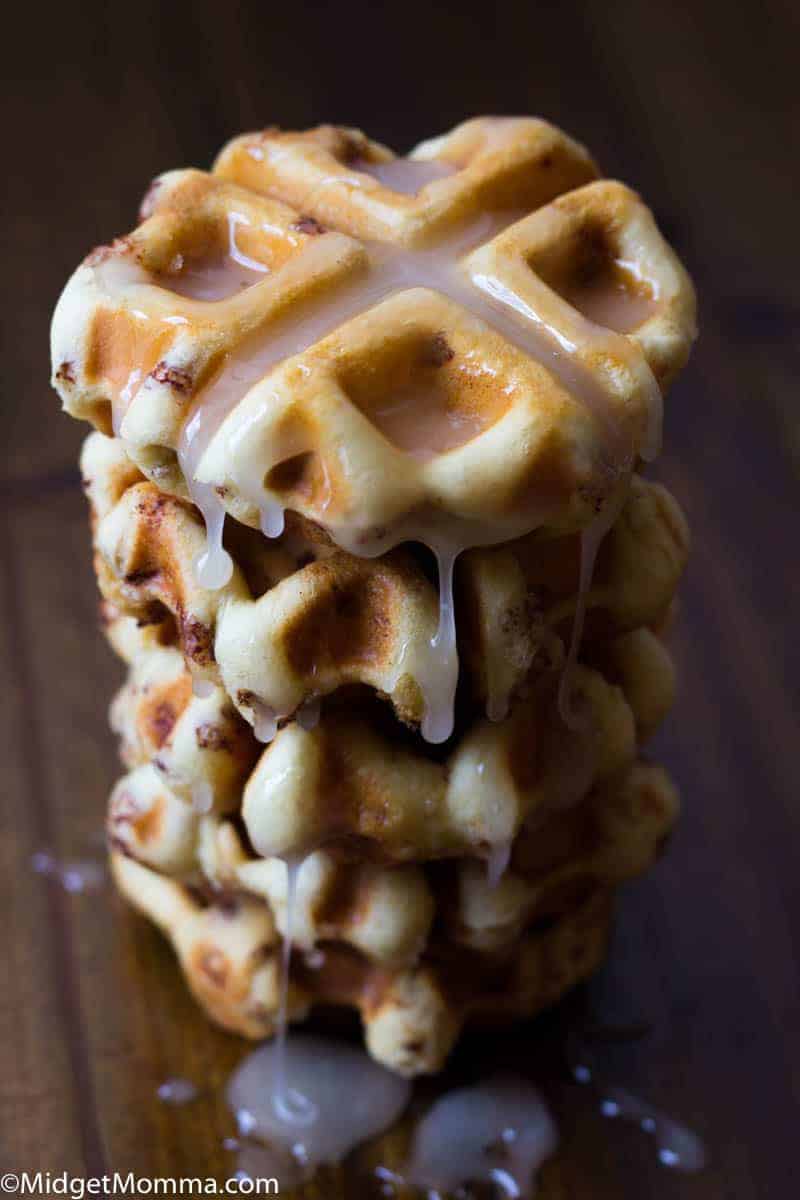 Stack of Cinnamon Roll Waffles drizzled with icing