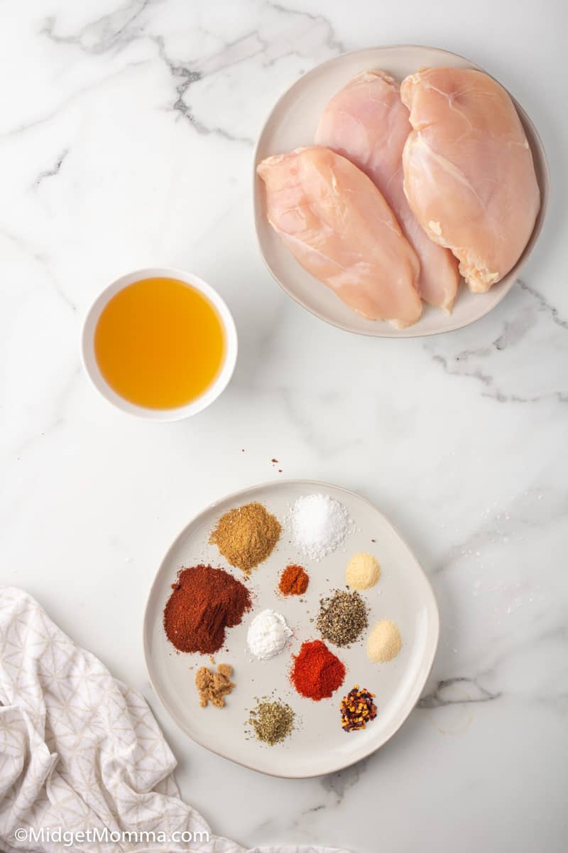 Slow Cooker Chicken Tacos ingredients - raw chicken and spices