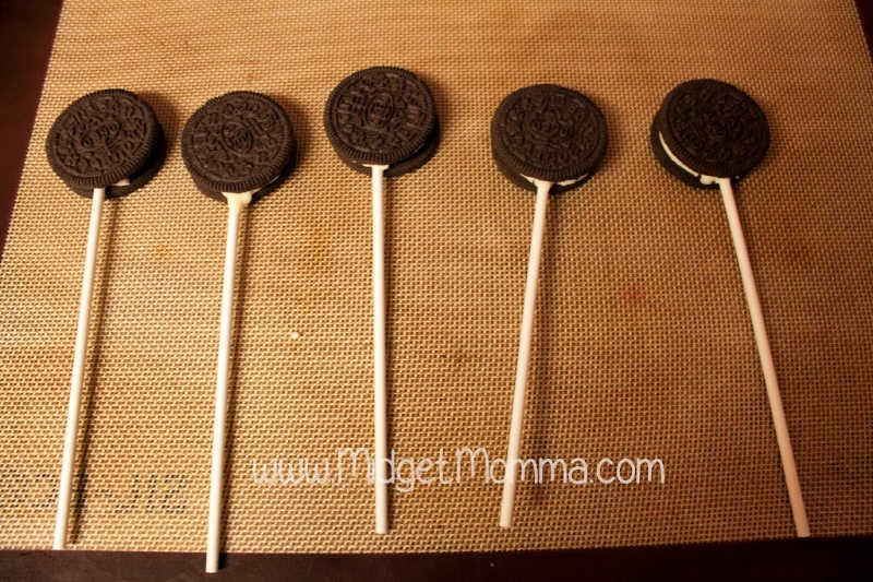 Oreo cookies with the lolipop stuck in