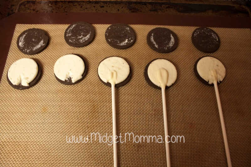 Valentine's Day Oreo cookies opened to put the lolipop stick in