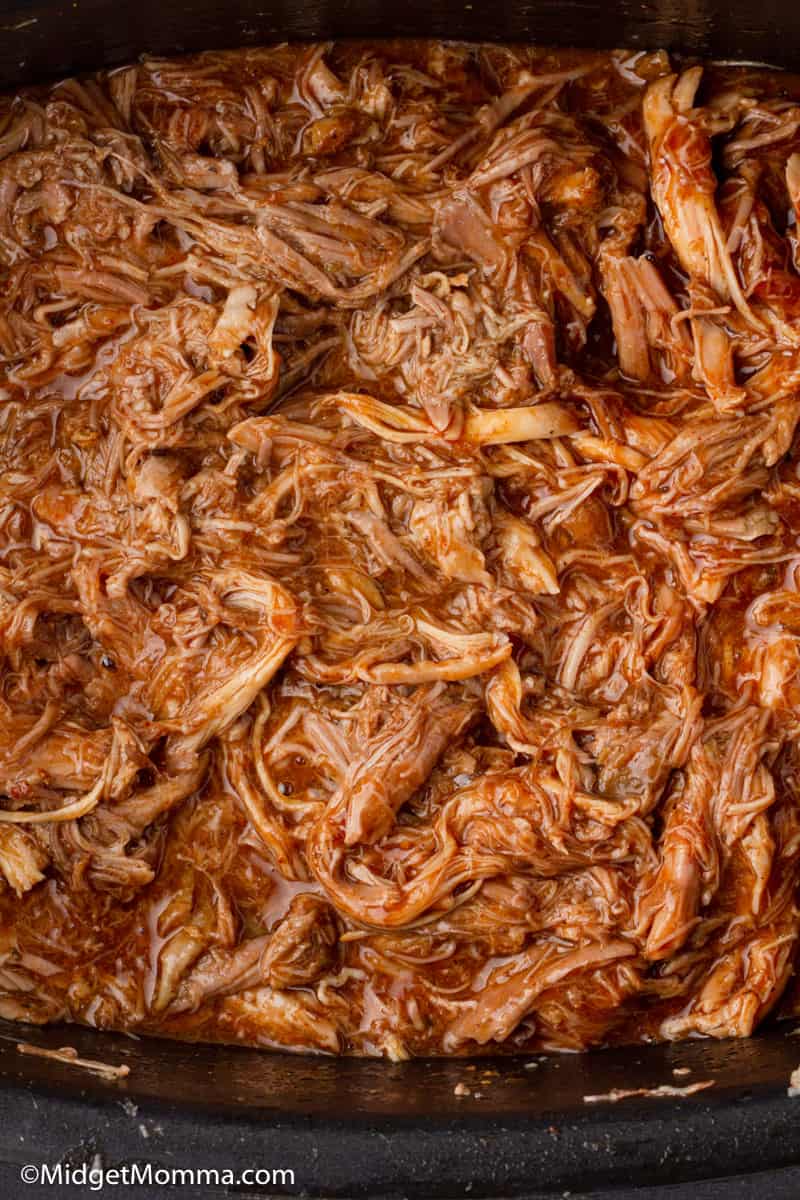 slow cooker pulled pork cooked in the slow cooker