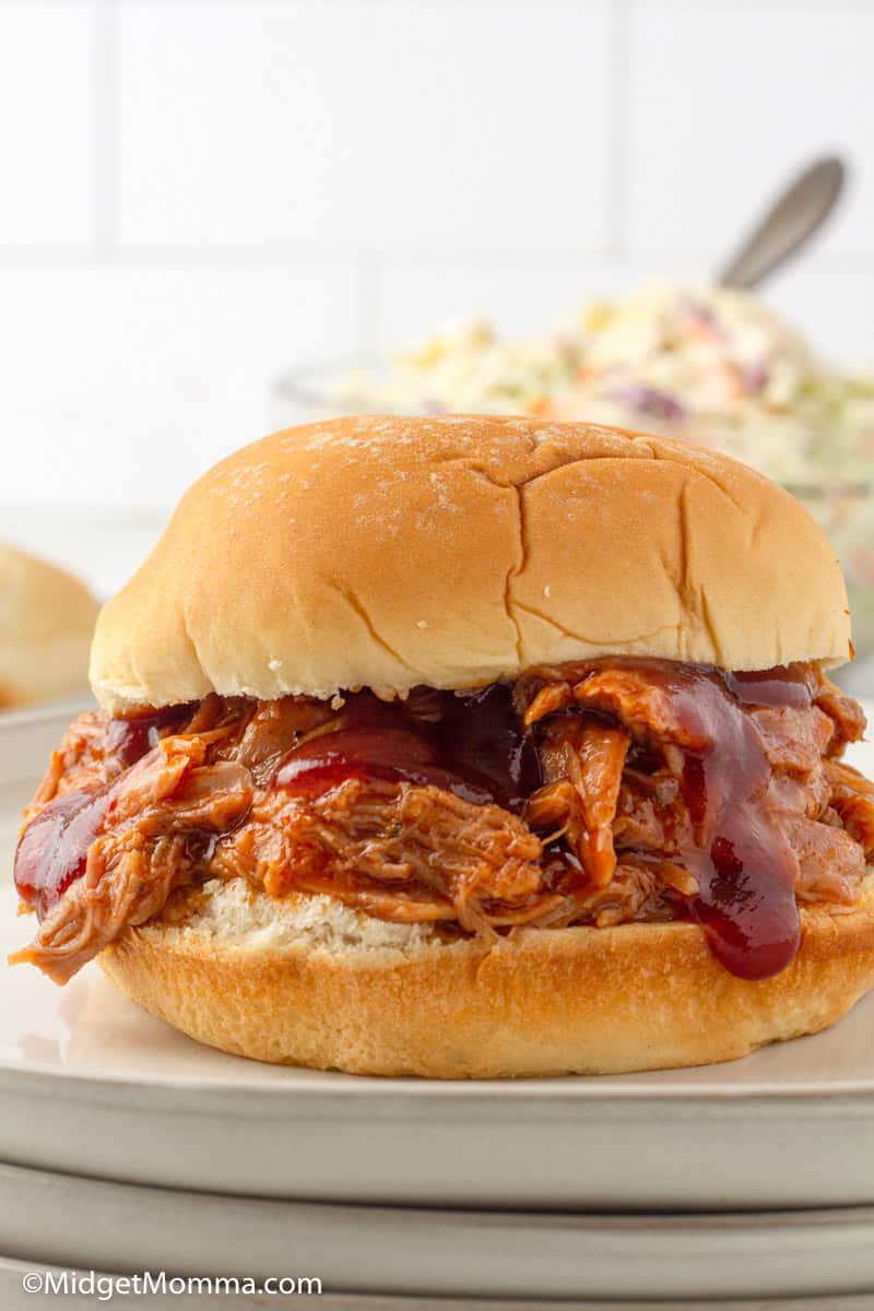 slow cooker pulled pork sandwich on a plate