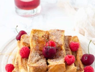 This easy homemade french toast stick recipe is the perfect breakfast. Once you make these Cinnamon and Sugar Homemade French Toast Sticks you will never want to eat frozen french toast sticks again! I have been told these easy french toast sticks taste just like cinnamon and sugar doughnuts!