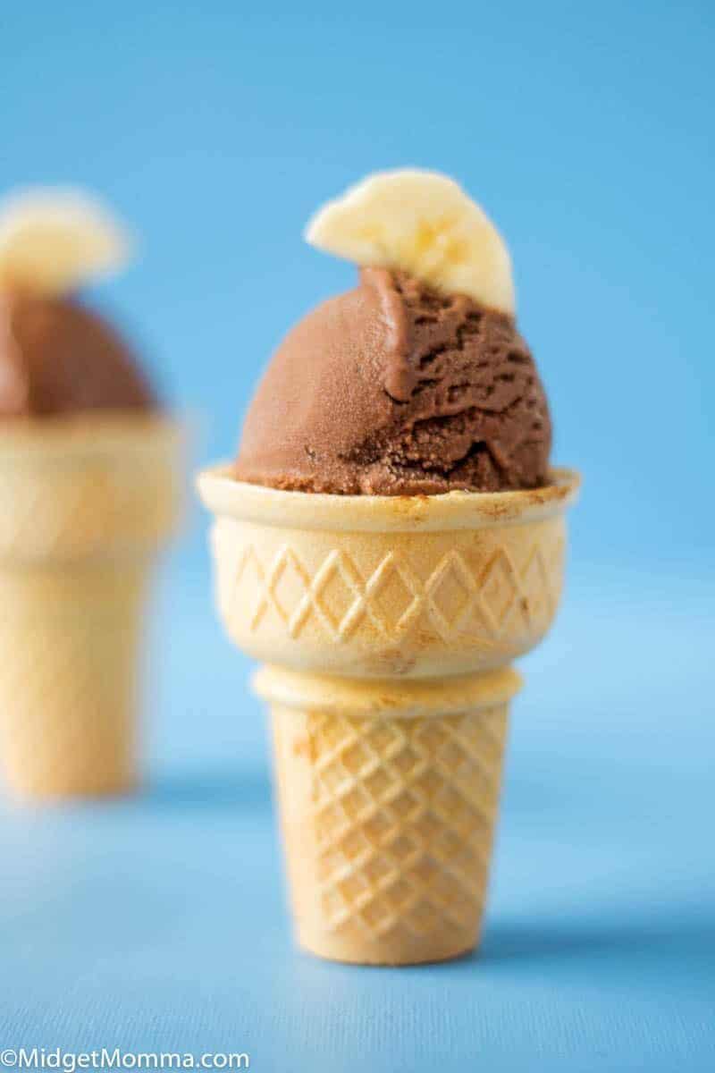 Banana Ice Cream with chocolate and peanut butter served in an ice cream cone