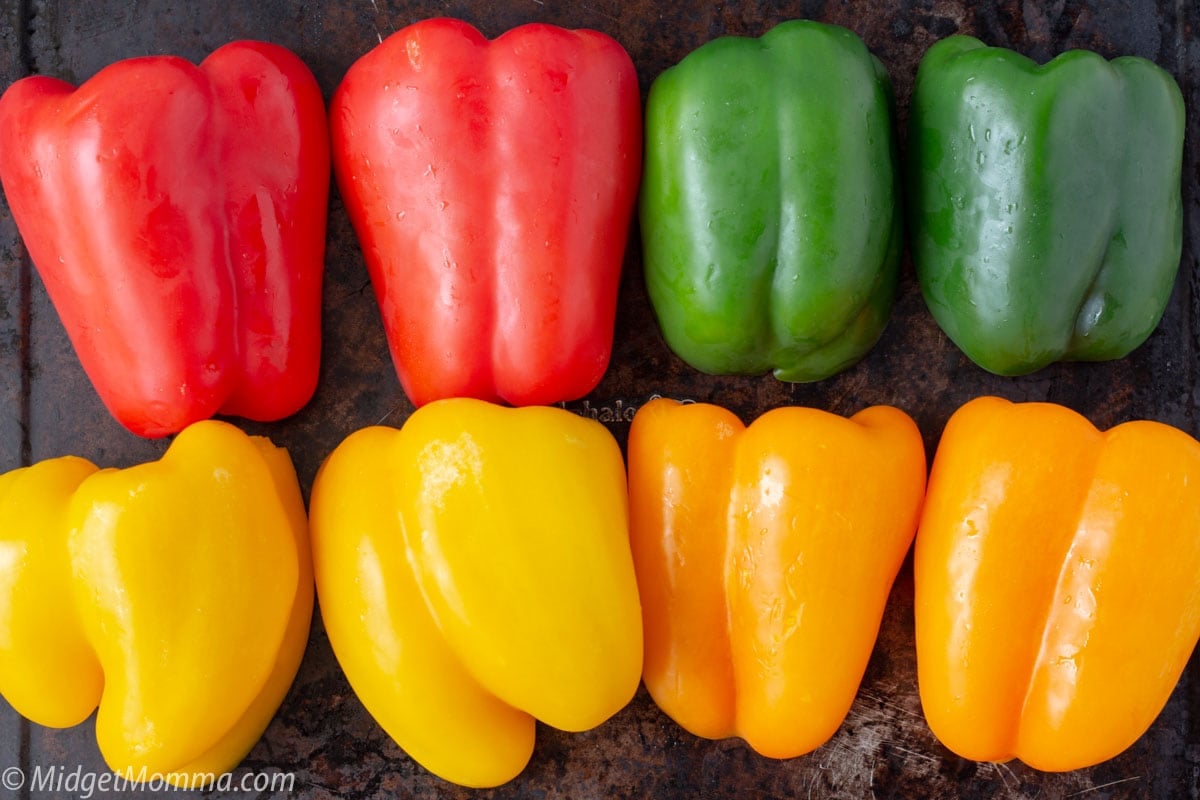 How to Roast Peppers - fresh peppers on a baking sheet