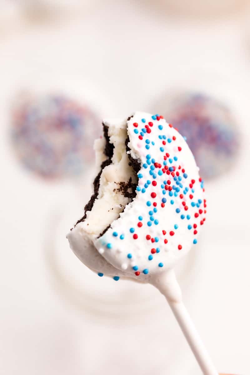 Red, White & Blue Chocolate Covered Oreos with a bite out of it