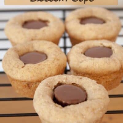 Peanut Butter Blossom Cup made with homemade peanut butter cookies and peanut butter cups. Its a fun twist on the classic cookie.