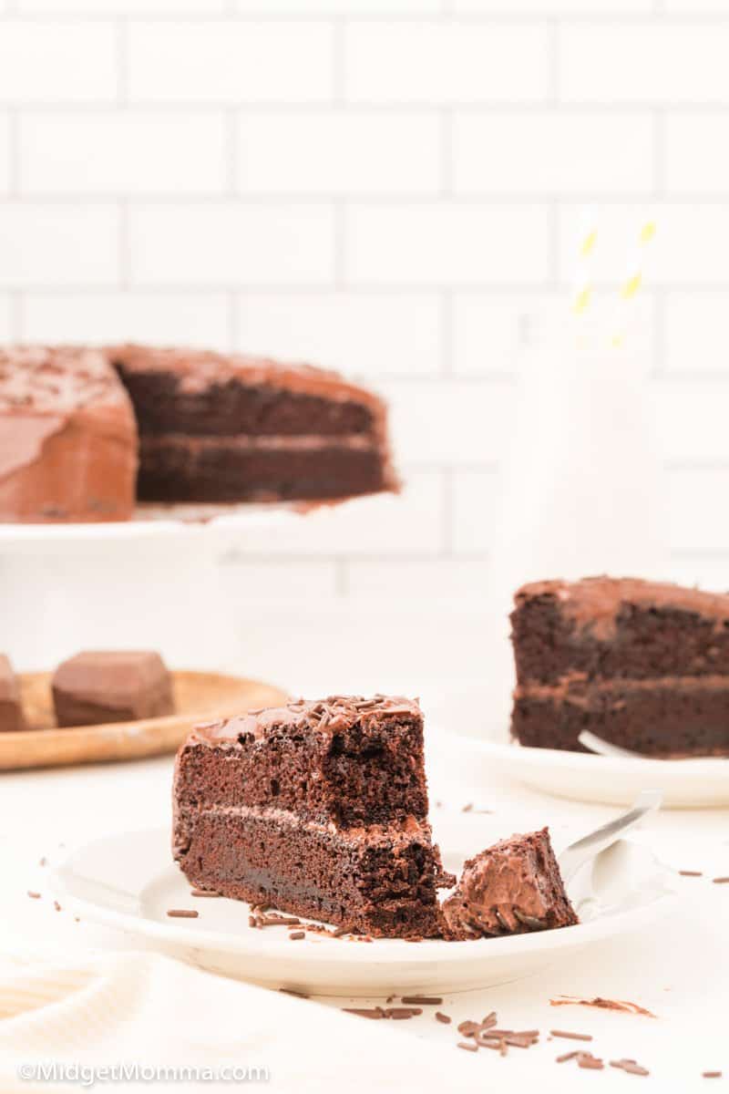 Slice of chocolate cake with Grandma's Old Fashion Chocolate Frosting on top