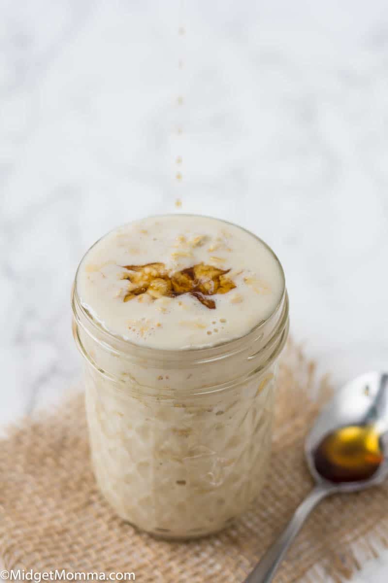 Maple overnight oats with real maple syrup in a mason jar with a spoon
