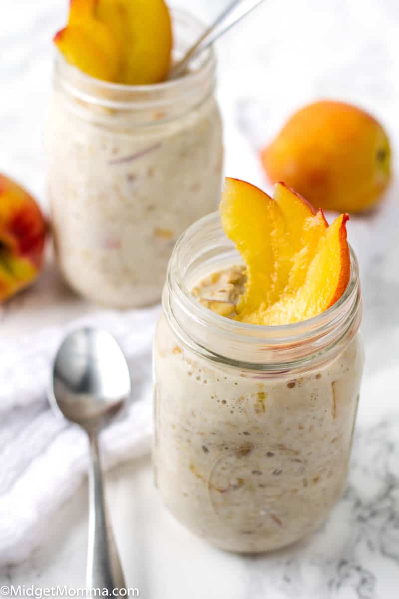 Easy overnight oats with peaches in a mason jar with a spoon