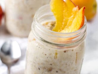 Peach overnight oats recipe in a mason jar