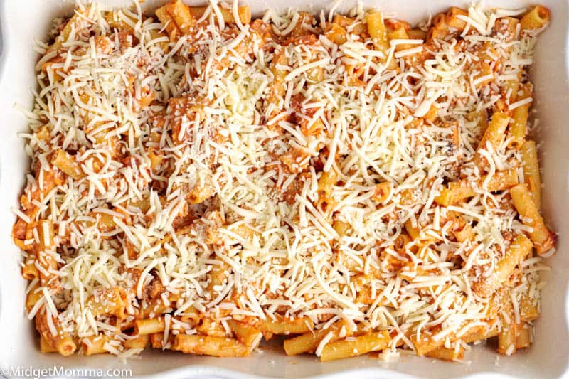 ingredients topped with cheese in baking dish