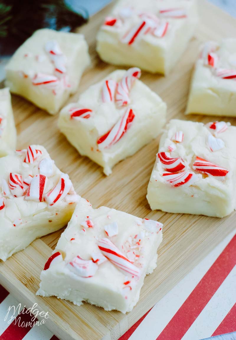 Peppermint fudge pieces cut up on a cutting board