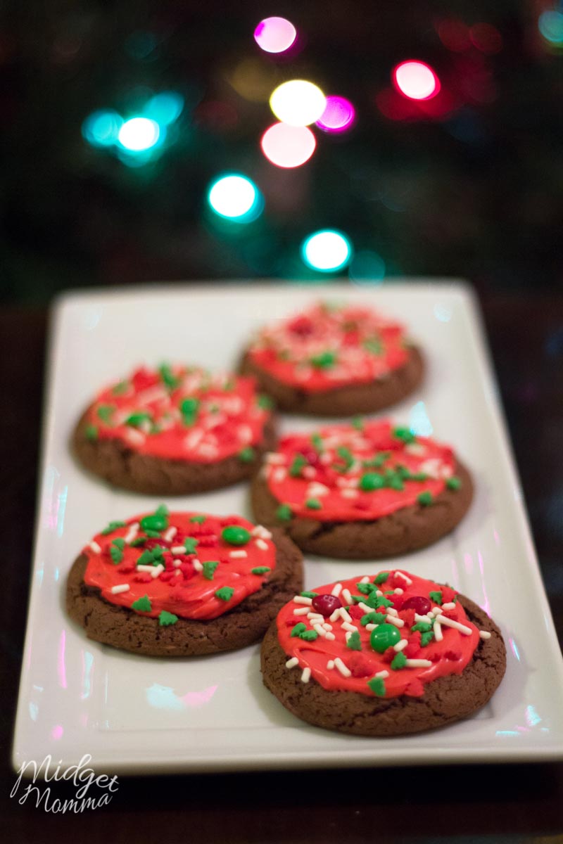 5 easy cake mix cookies with red peppermint frosting and M&Ms on a white platter