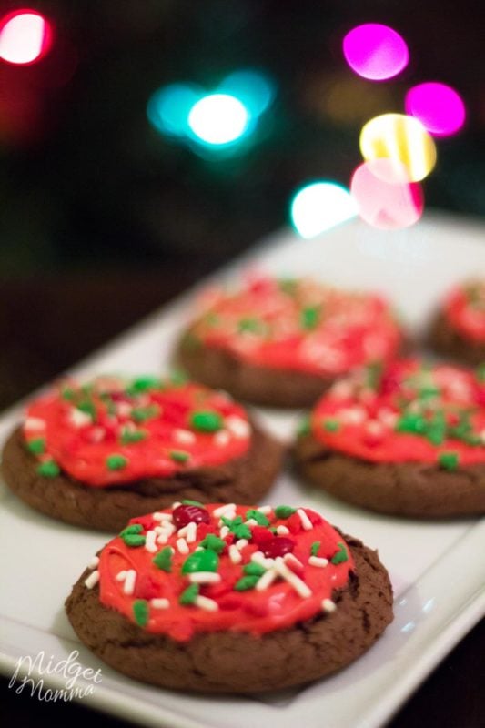 Chocolate cake cookies with red frosting and sprinkles