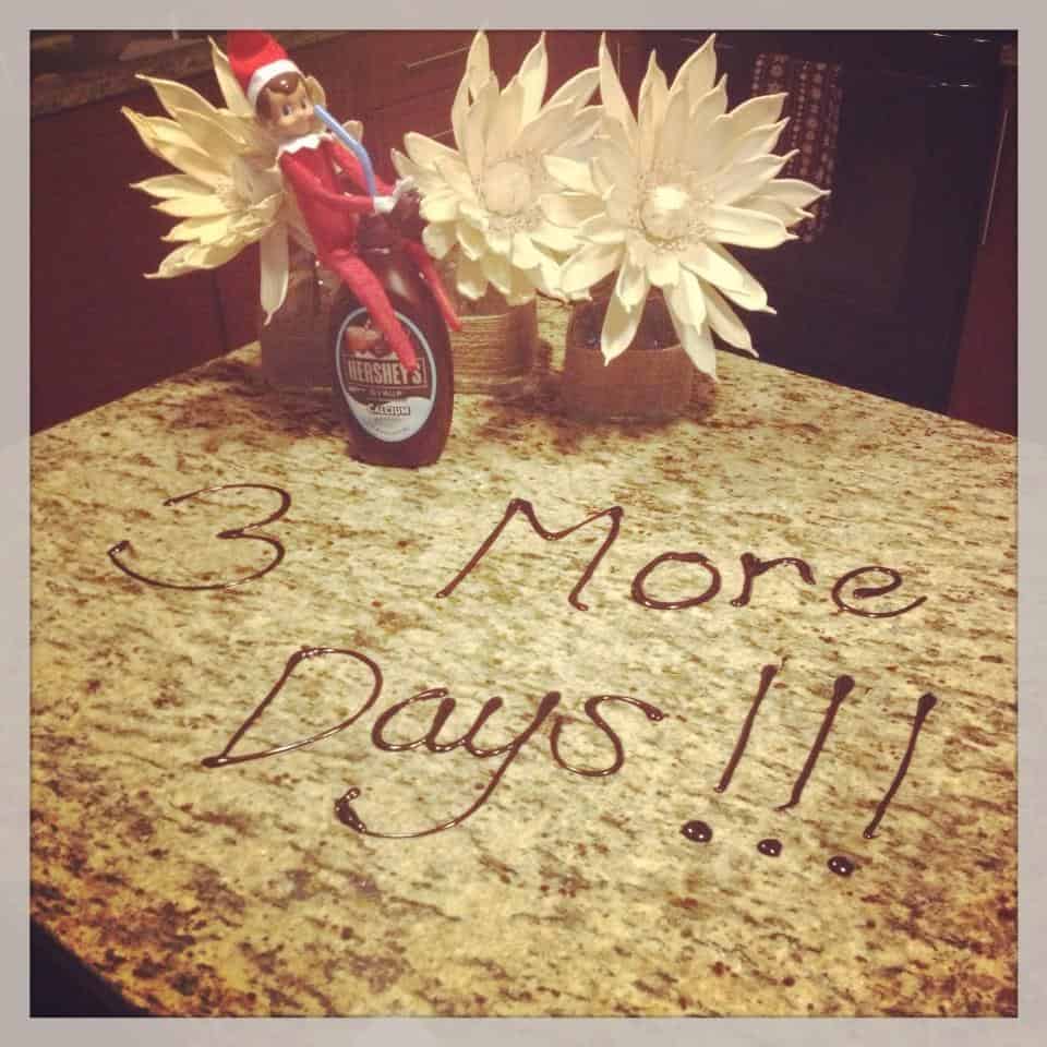 elf on the shelf draws on the counter with chocolate syrup