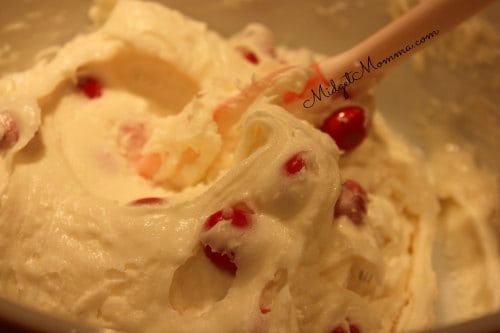 bowl of white chocolate fudge being mixed together