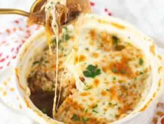 This French Onion Soup will make your guest feel like you spend a lot of time making it. Easy French Onion Soup is actually a simple soup with rich full beefy flavor. Making this homemade french onion soup will make you feel fancy right at home while enjoying this amazing homemade soup recipe. #FrenchOnion #SoupRecipe #FrenchOnionSoup #EasySoupRecipe