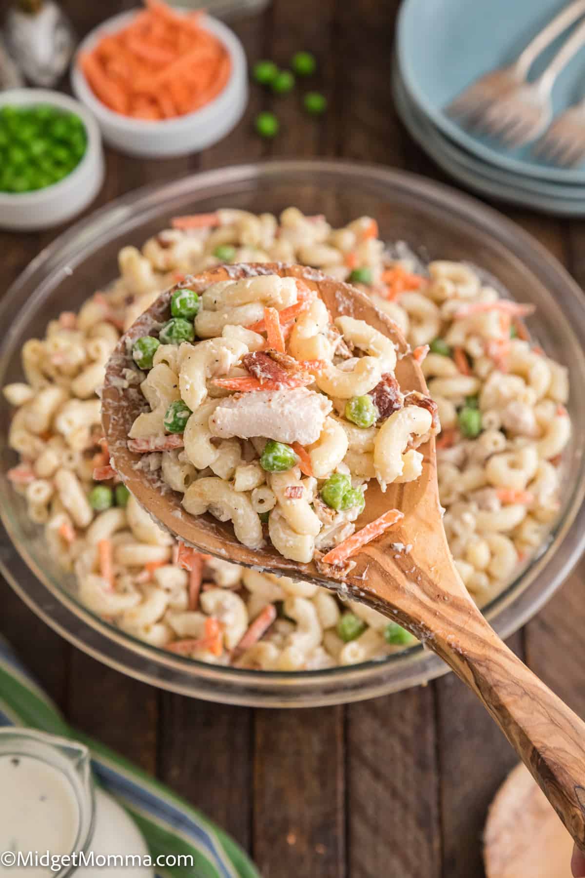 heaping serving spoon full of Chicken Bacon Ranch Pasta Salad