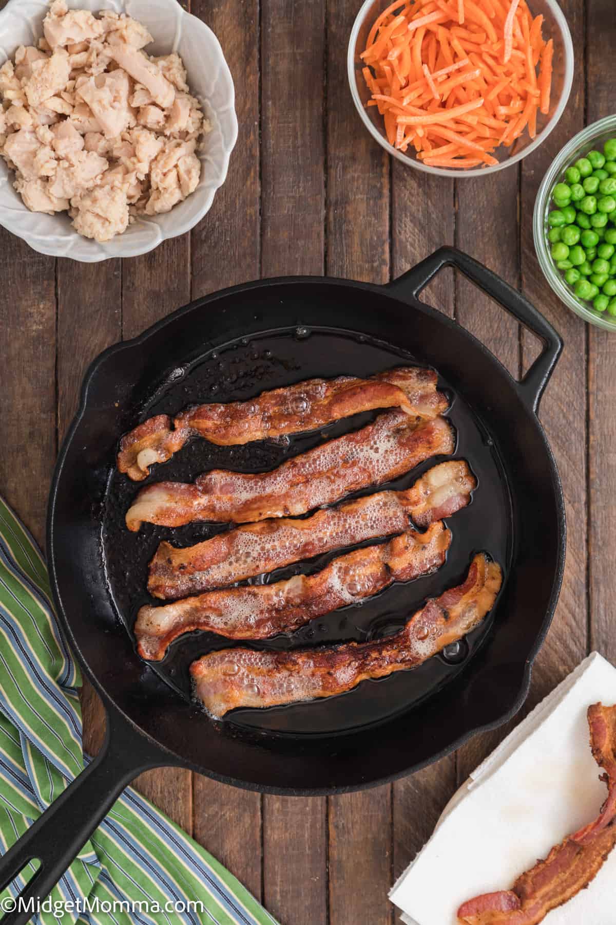 bacon cooking in a skillet