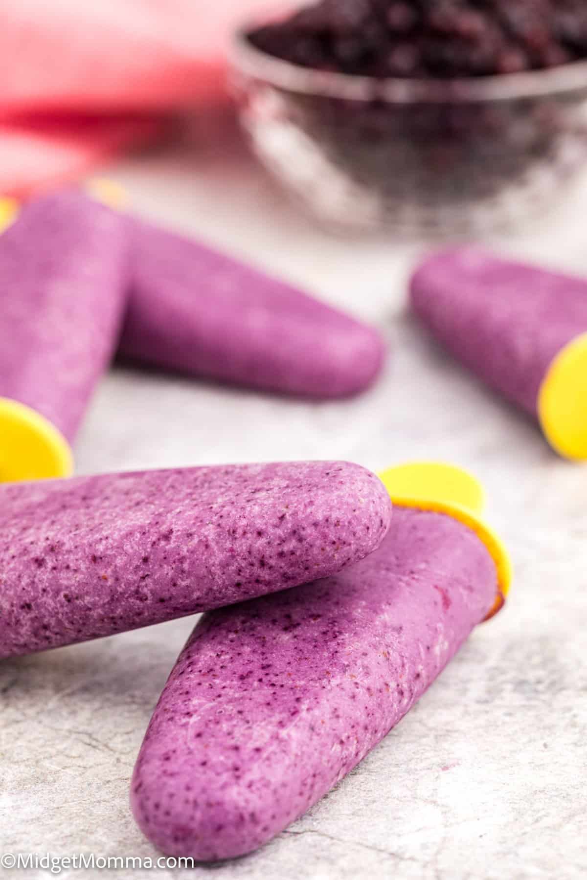 side view of Pineapple Banana Blueberry Yogurt Popsicles