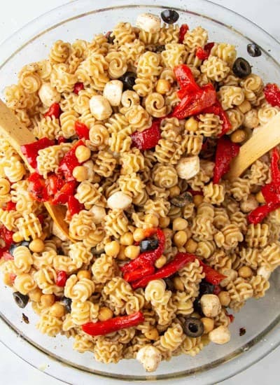 Balsamic roasted red pepper pasta salad in a glass bowl