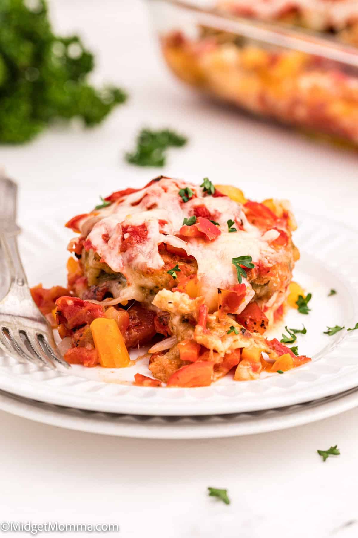 front shot of a serving of Baked Eggplant Parmesan on a plate