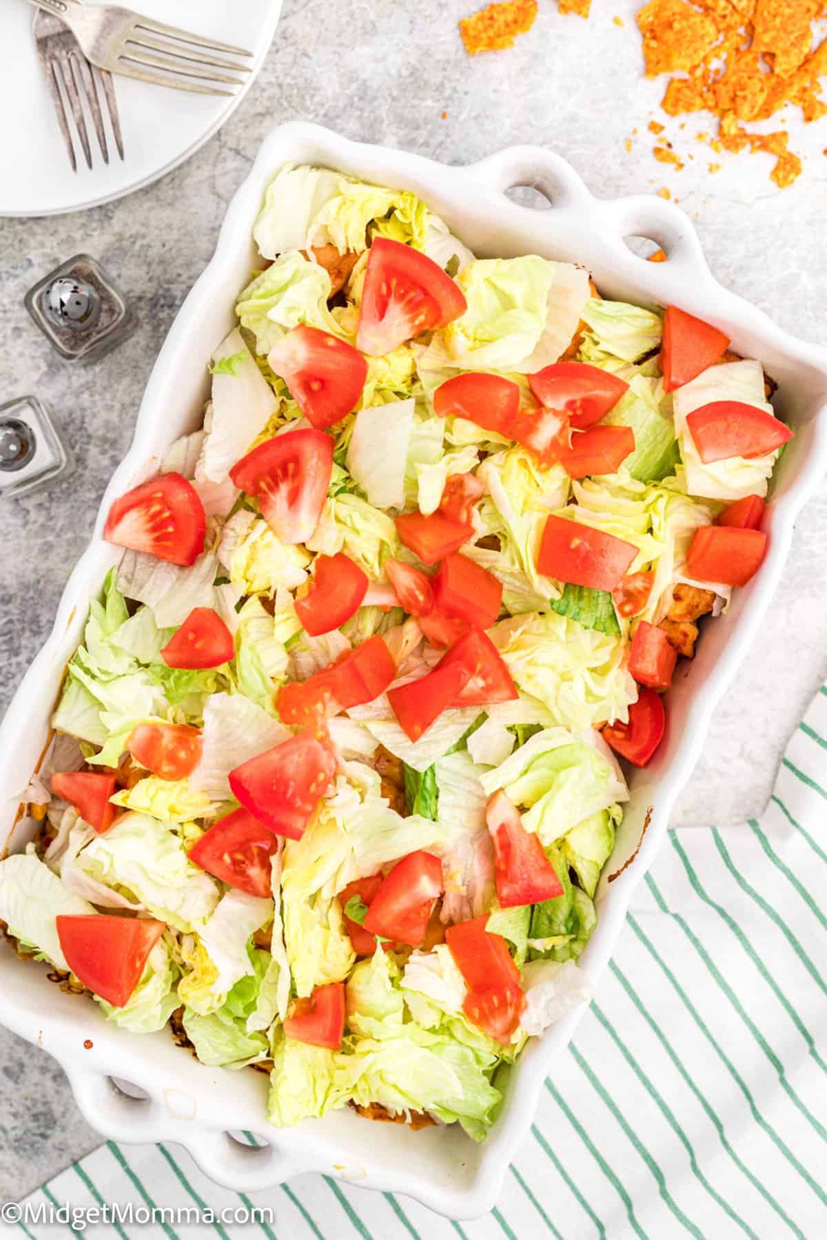 overhead photo of Cheesy Doritos Chicken Casserole recipe in a casserole dish