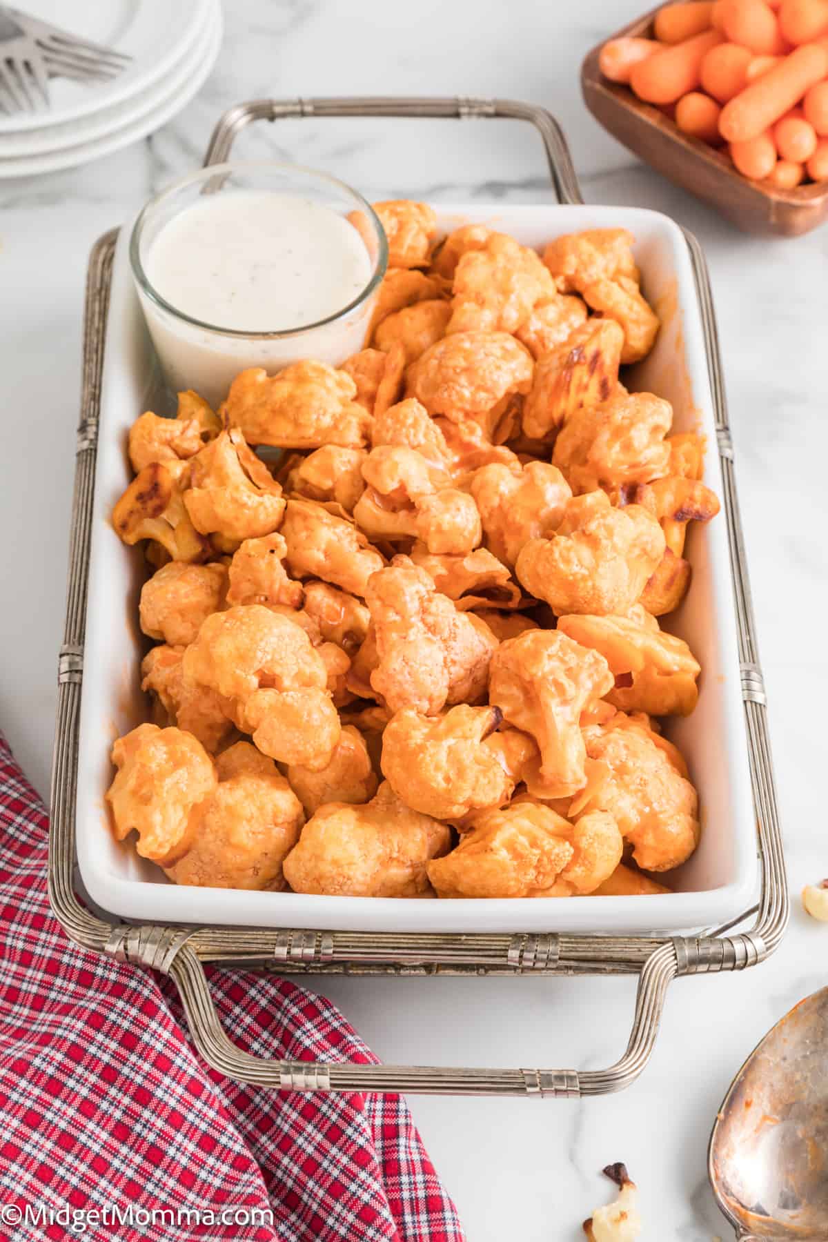 large serving dish with Oven Baked Spicy Buffalo Cauliflower Bites 