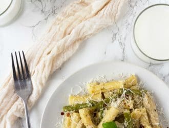 My family loves it when I make this Chicken Asparagus Alfredo Pasta. It is an easy pasta dish with ziti noodles, chicken and asparagus tossed in a creamy Alfredo Sauce!